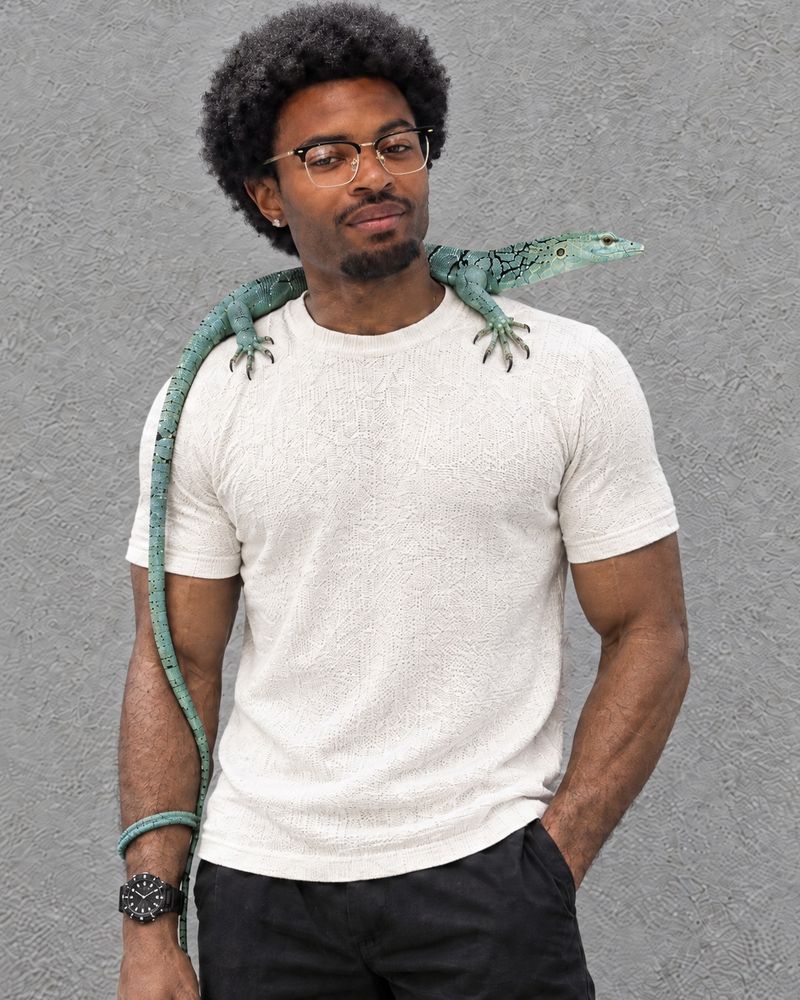 Jonah Hamilton with Cado, his tree monitor lizard